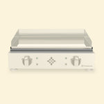 Destacamos el recipiente recogegrasas de la plancha Vivaplancha, mientras que el resto del aparato se muestra intencionadamente difuminado.